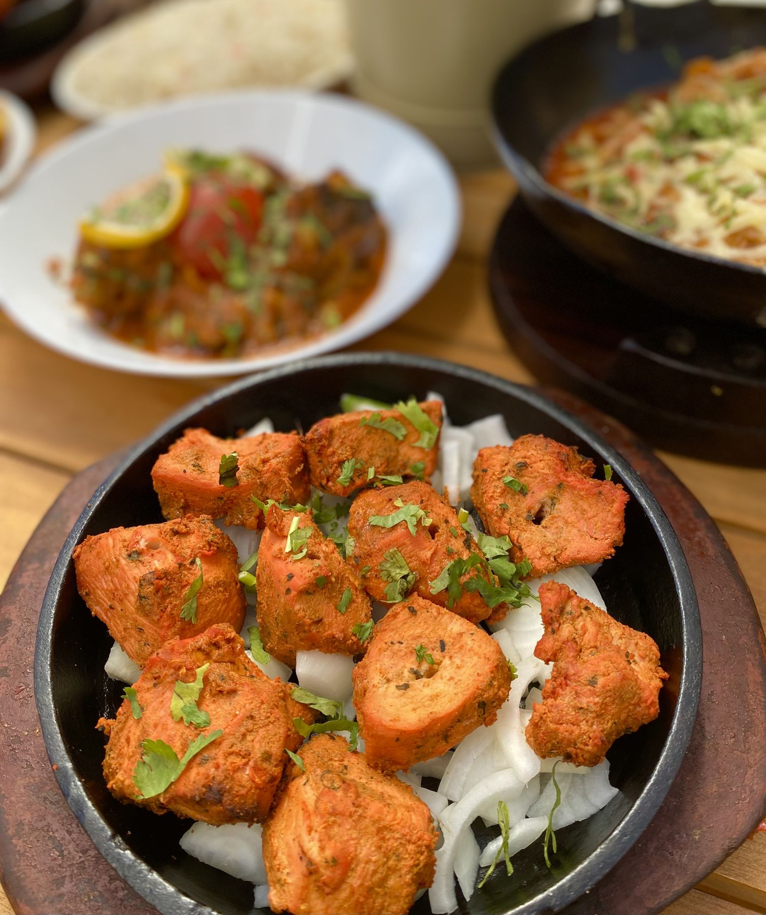 Chicken tikka fresh from the tandoor at Dhaka Tandoori